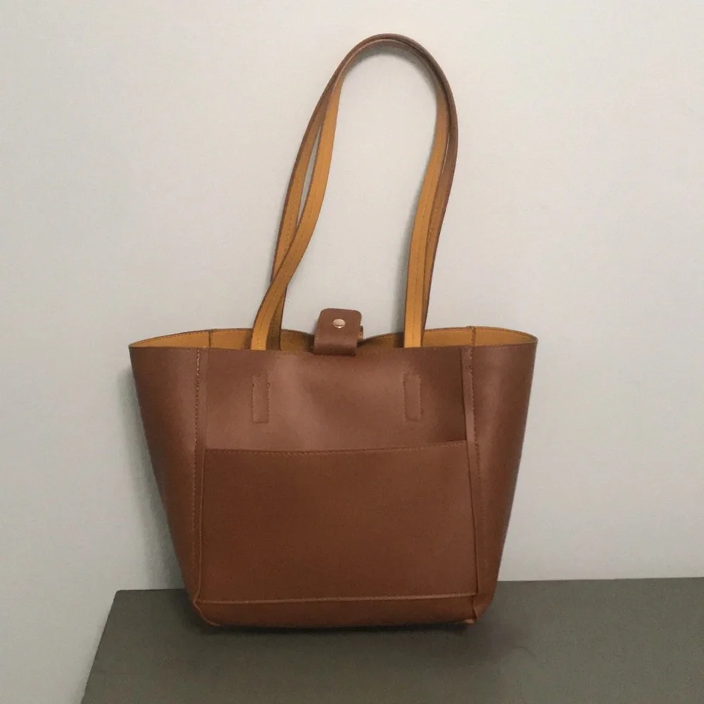 Tommy Bahama Reversible Faux Leather Tote Wristlet - Picture 8 of 16